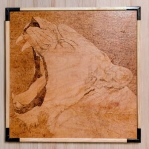 Close up pyrography of a roaring lioness on a 60cm by 60cm Hardwood board